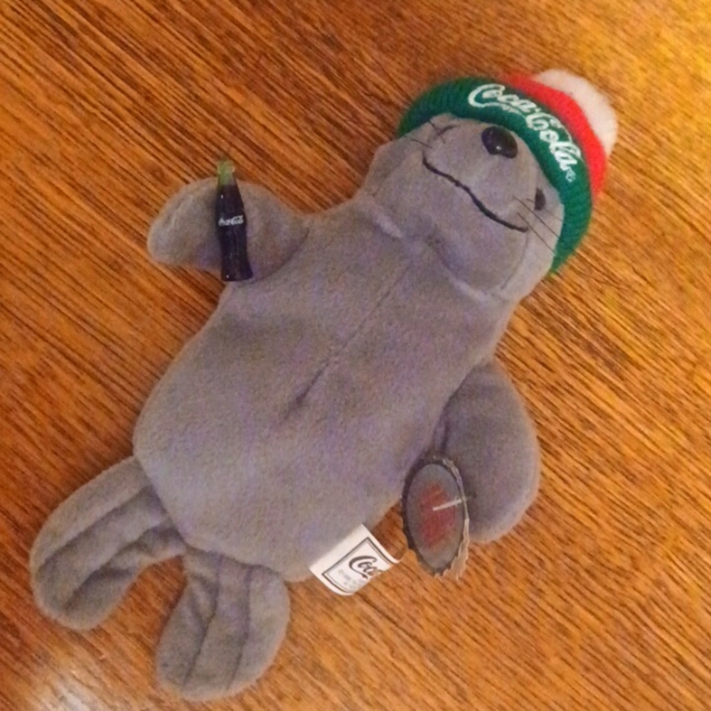 Coca cola seal in Christmas Colored ski cap